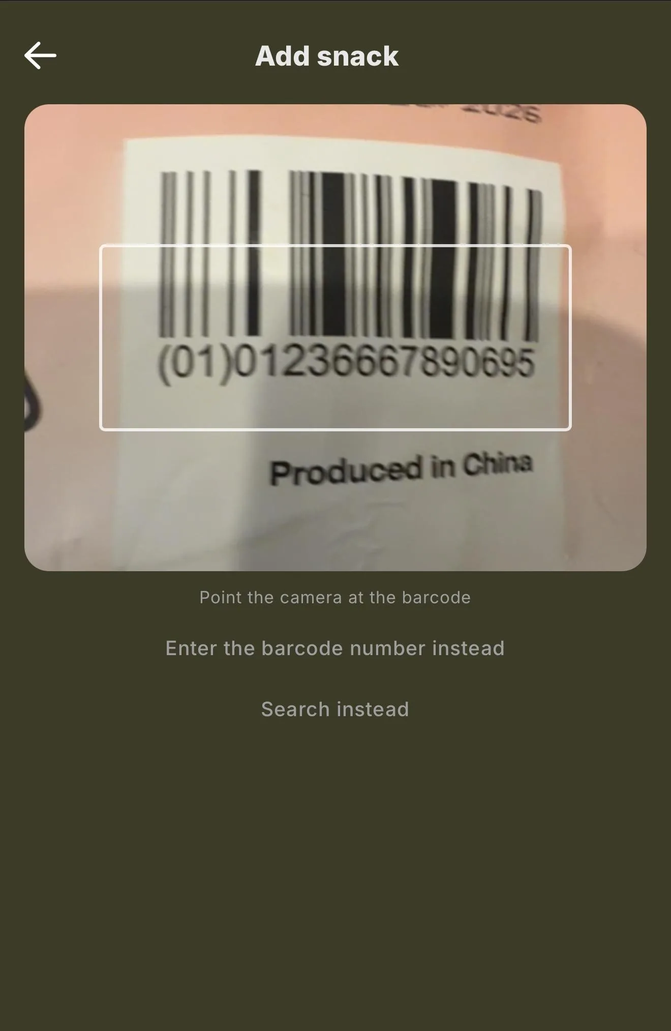 The barcode scanner open in the client app, pointed at a package